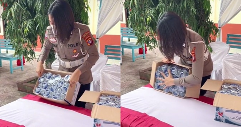 Cara polwan keluarkan air mineral gelas dari kardus ini bikin kagum