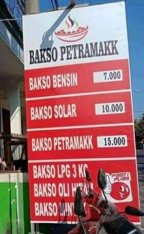 potret tulisan di spanduk promosi © berbagai sumber
