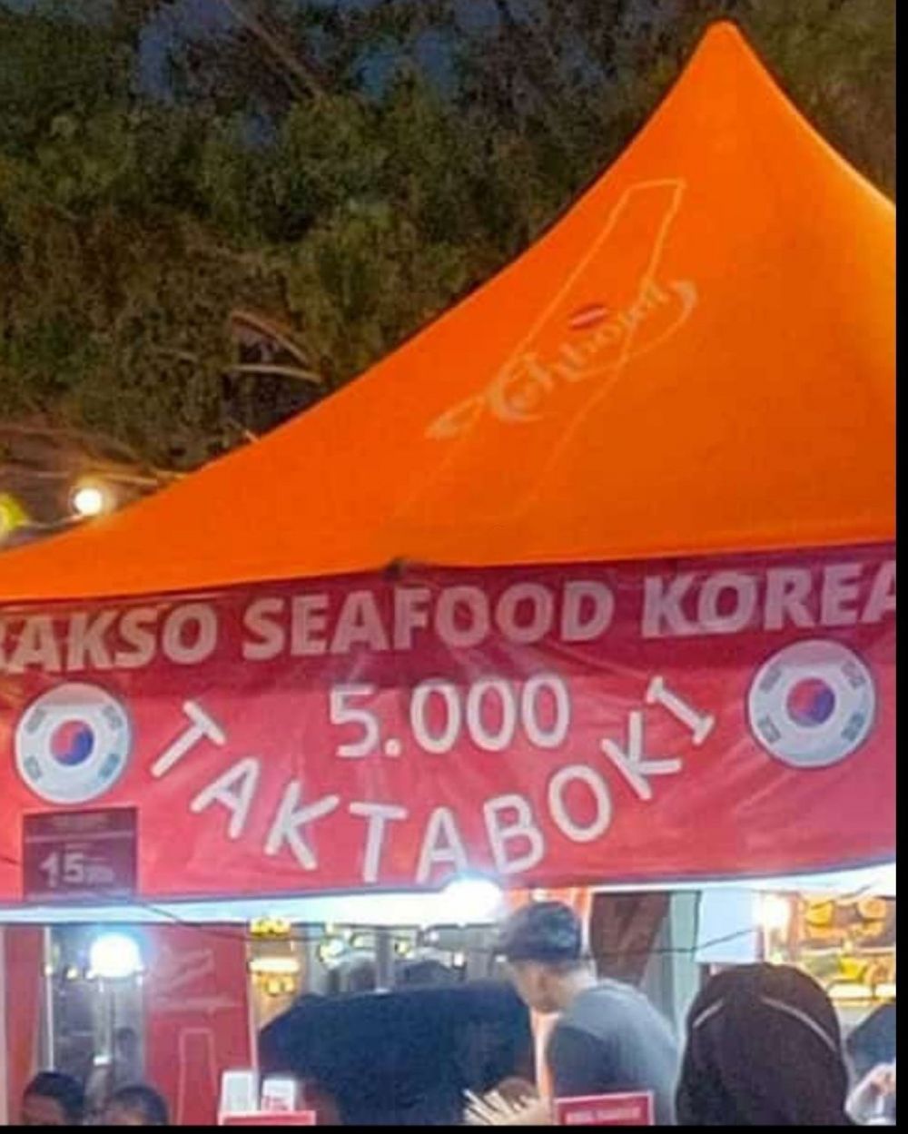 potret tulisan di spanduk promosi © berbagai sumber