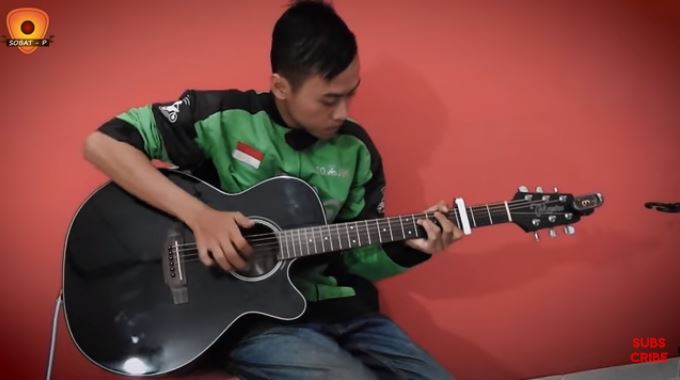 driver ojek online berbakat main musik lucu © berbagai sumber