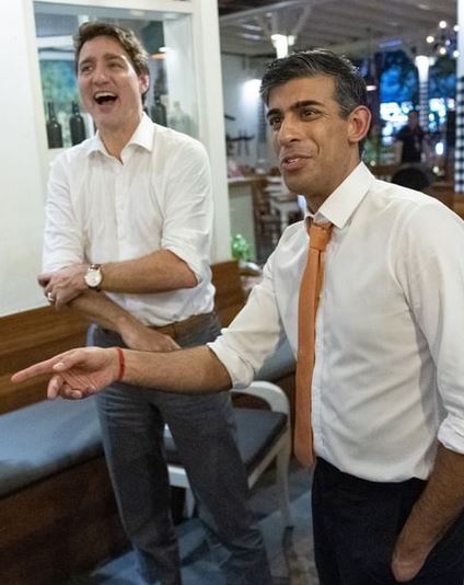 beda gaya PM Kanada dan PM Inggris © 2022 brilio.net