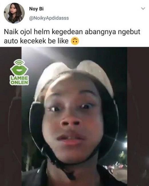 derita penumpang ojek online pakai helm © berbagai sumber derita penumpang ojek online pakai helm © berbagai sumber