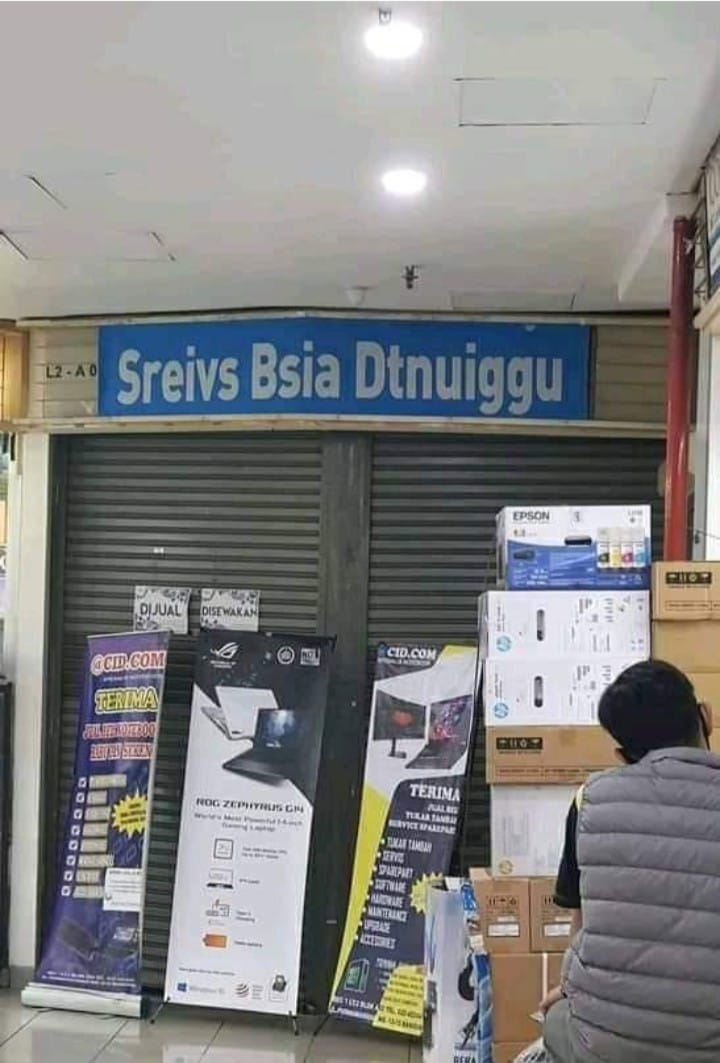 salah tulis spanduk © Facebook