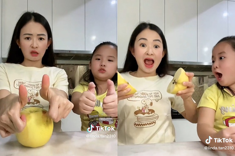 Tak perlu pakai pisau, begini cara membelah buah apel menggunakan tangan