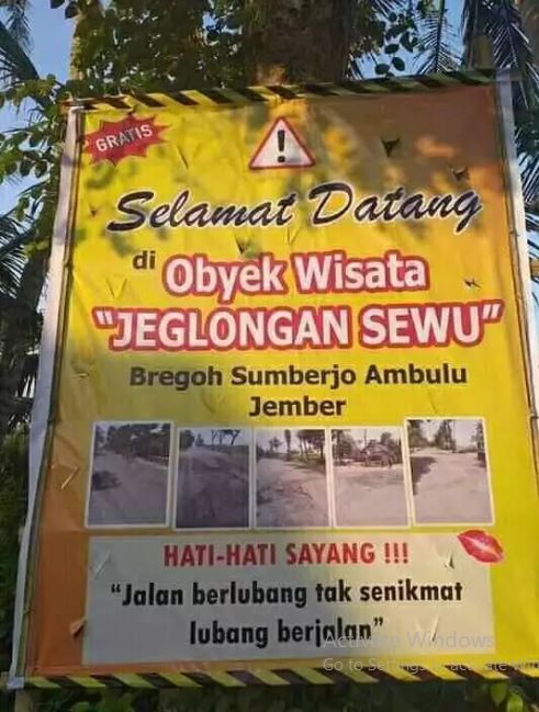 spanduk di tempat wisata © berbagai sumber