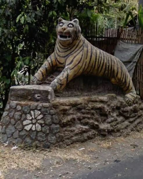 Potret kocak tugu macan Berbagai sumber Potret kocak tugu macan Berbagai sumber