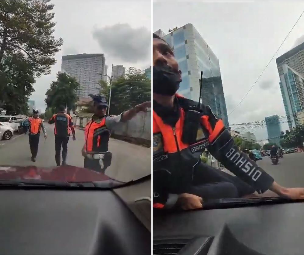 petugas dishub di kap mobil © X