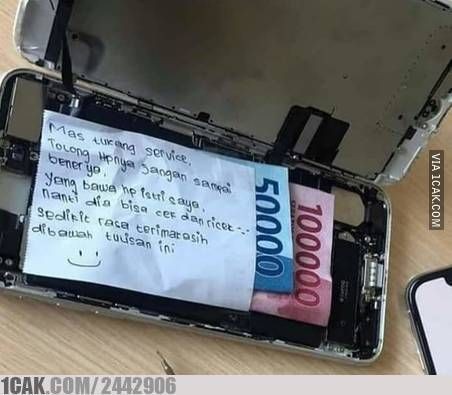 Potret kocak spanduk tukang servis HP © X