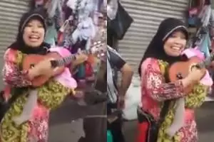 Ibu pengamen menggendong bayi ini bikin Ayu Ting Ting tersaingi