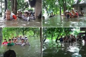 15 Foto heroik polisi evakuasi korban banjir ini tuai simpati netizen
