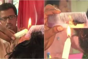 Gokil, tukang cukur ini pakai api lilin untuk memotong rambut