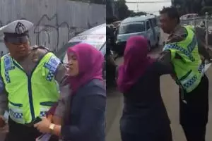 Tak terima ditilang, emak-emak ini malah ngamuk dan mencakar polisi