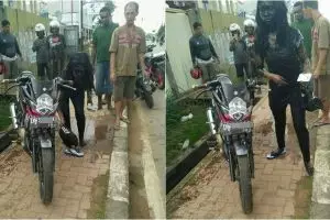 Naik motor sambil main HP, gadis ini berakhir nyungsep ke selokan