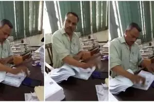 Aksi petugas kantor lagi nyetempel ini bakal bikin kamu bilang 'wow'