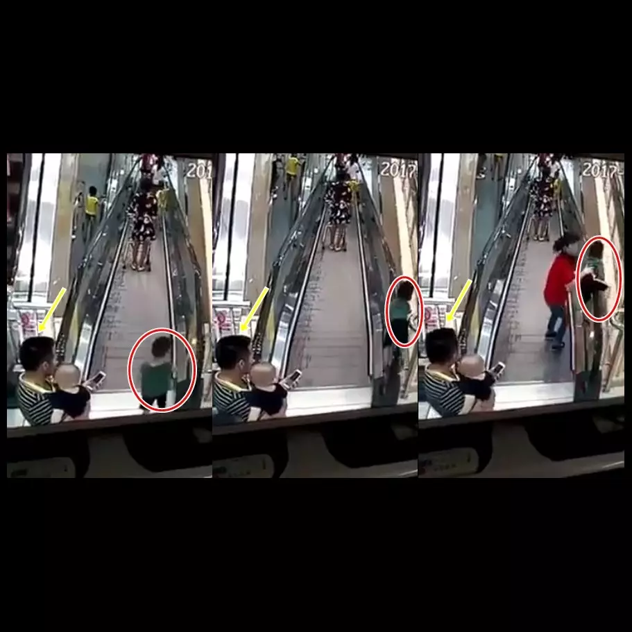 Sang ayah sibuk main HP, anak ini hampir jatuh dari eskalator