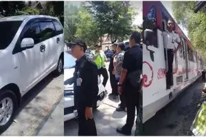 Gara-gara diparkir di atas rel, mobil ini bikin kereta gagal melintas