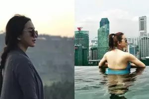 5 Momen Aura Kasih pamer tubuh mulusnya di kolam renang