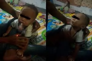 Sungguh tega, pria ini memasukkan rokok ke mulut balita