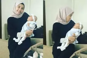 7 Rona bahagia Laudya Bella gendong bayi, tampak penyayang banget