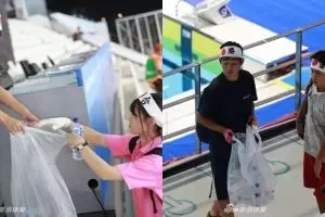 Selain puntung rokok, suporter Jepang juga bersihkan arena renang AG 