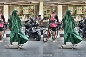 Cewek bercadar main skateboard ini bikin heboh, gayanya nyentrik