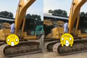 Pria ini treadmill di roda eskavator, aksi gokil bikin geleng kepala