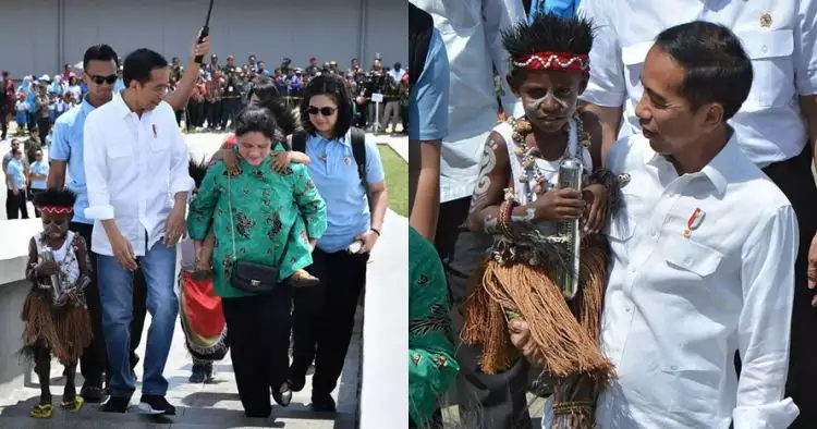Momen Iriana Jokowi gendong bocah Papua naiki 105 anak tangga