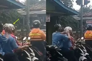 Naik motor hujan-hujanan tanpa helm, dua cowok ini malah keramas