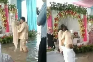 Perjuangan pria gendong pengantin wanita di tengah banjir, salut