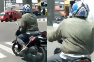 Aksi pemotor nggak mau turunin kaki di perempatan ini kocak abis