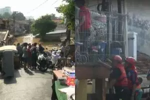 10 Foto proses evakuasi warga korban banjir Kali Ciliwung