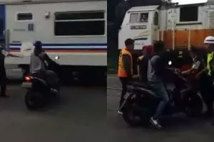Paksa terobos palang kereta, kelakuan pria ini bikin geram