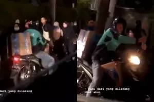 Viral driver ojek online bagikan minum ke mahasiswa demonstran