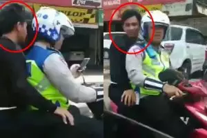 Viral polisi boncengi pria tak pakai helm, ditegur warga