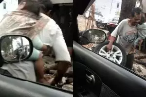 Kisah pilu pria tukang tambal ban bekerja sambil gendong anak