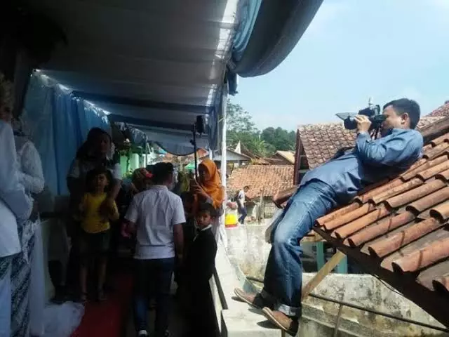 potret lucu totalitas fotografer © 2019 1cak.com