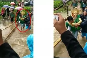 Detik-detik haru mempelai pria gendong istri seberangi sungai