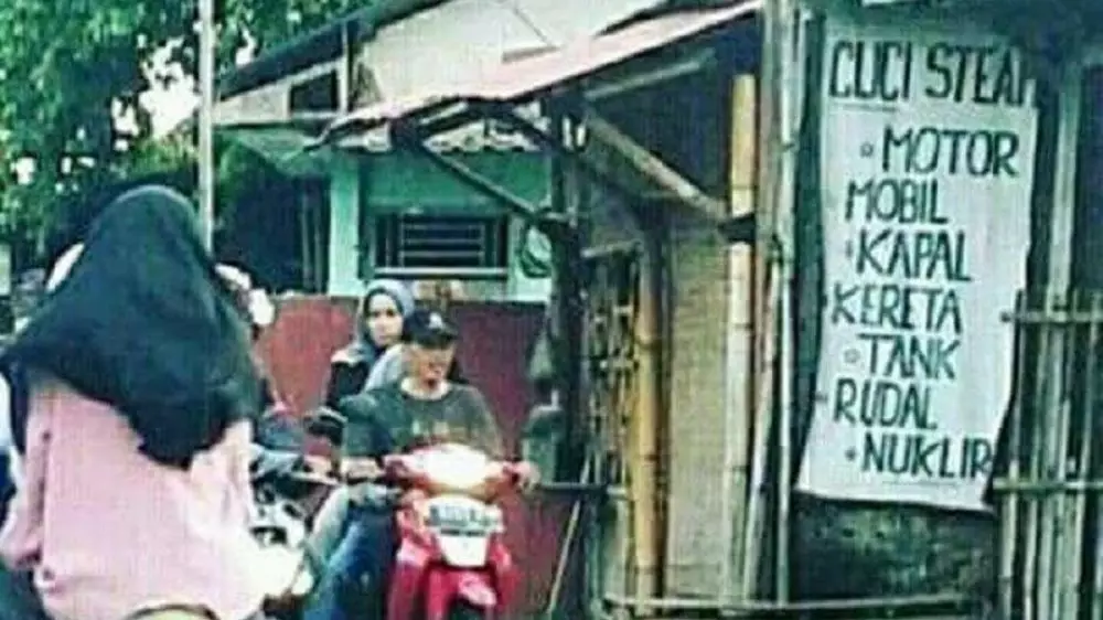 spanduk absurd bikin geleng kepala © 2020 1cak.com