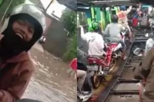 Cara pemotor lewati banjir Jakarta ini kreatif abis, bebas basah