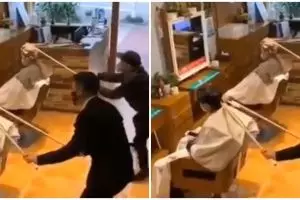 Cara unik tukang cukur rambut di China hindari virus Corona