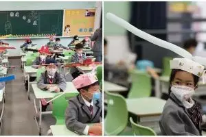Sekolah kembali buka, murid di China pakai topi physical distancing