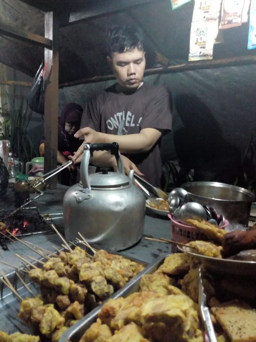 potret pedagang mirip penyanyi berbagai sumber