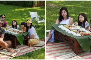 9 Momen liburan Wulan Guritno & keluarga, makan beralas daun pisang