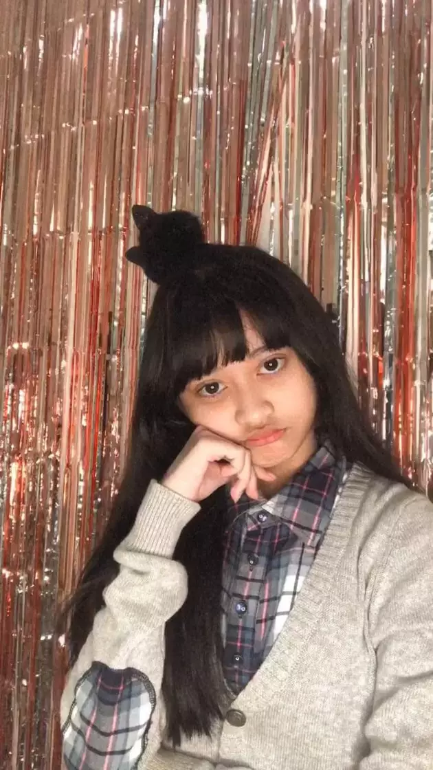 Potret Caitlyn Gwyneth Santoso member termuda JKT48 © 2020 Twitter/@G_CaitlynJKT48