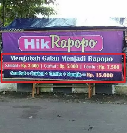 Keterangan di spanduk toko © Twitter Keterangan di spanduk toko © Twitter