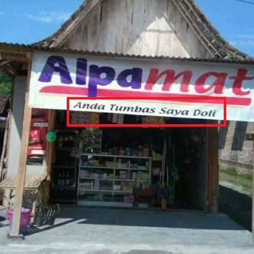 Keterangan di spanduk toko © Twitter Keterangan di spanduk toko © Twitter
