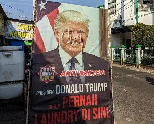 Desain lucu spanduk usaha © berbagai sumber