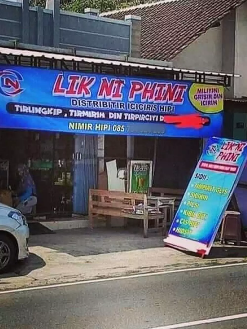 spanduk huruf vokal I © berbagai sumber