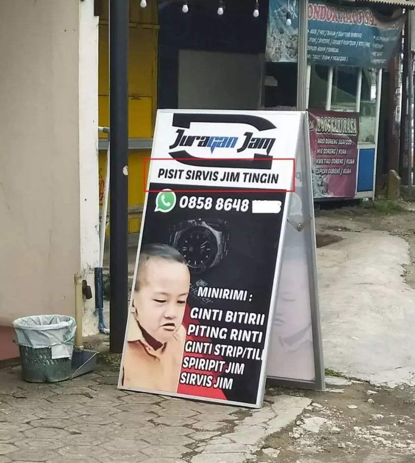 spanduk huruf vokal I © berbagai sumber