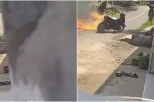 Viral aksi berani pemuda sendirian padamkan motor terbakar